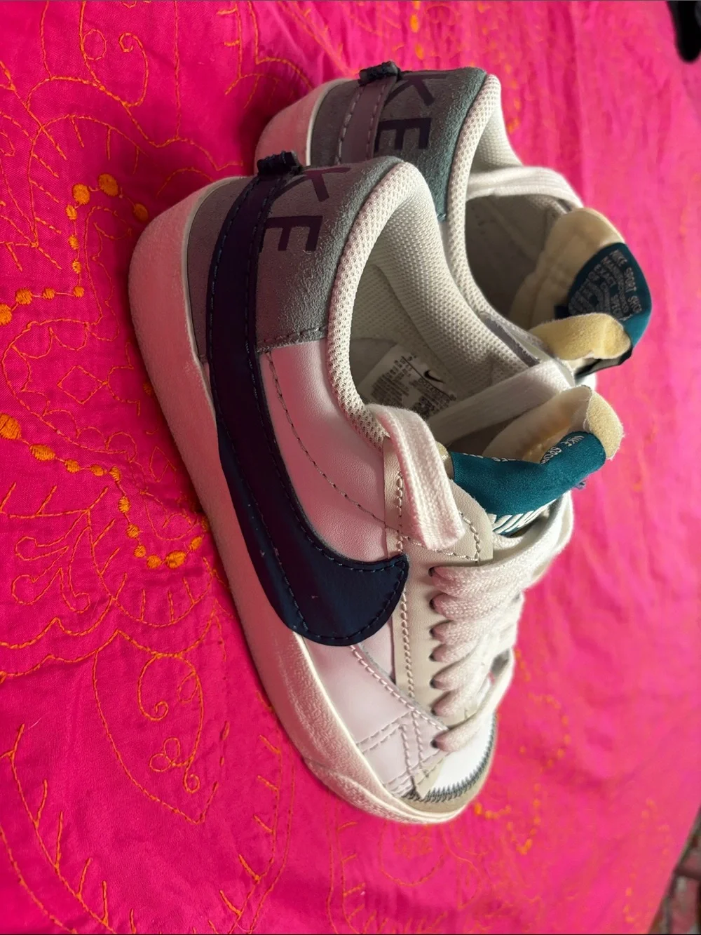 Nike Women’s Low-Top Sneakers in White and Teal
